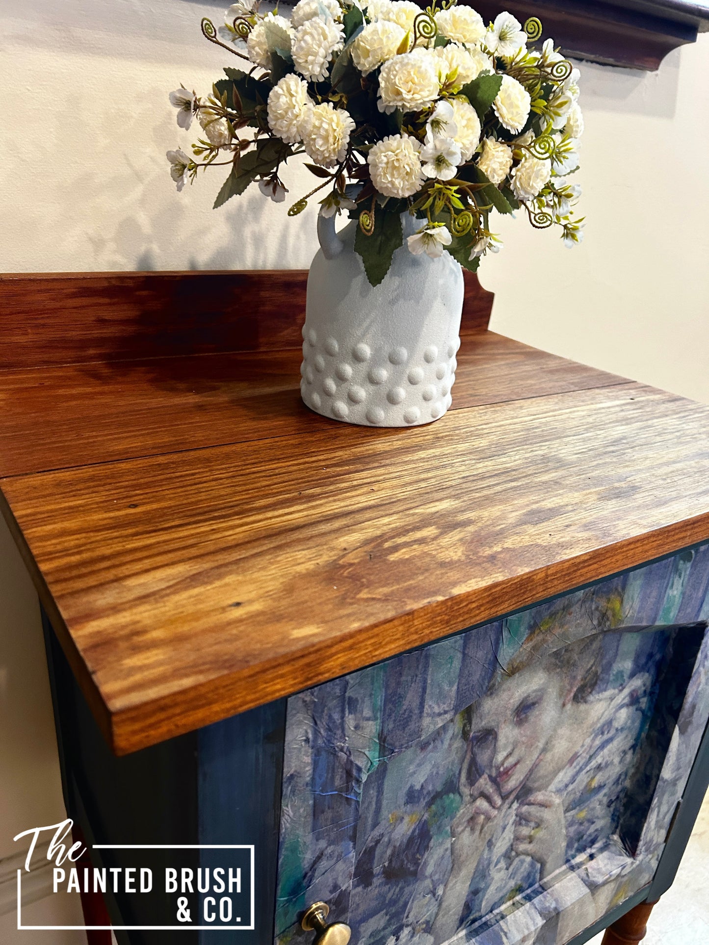 Woman in blue cabinet