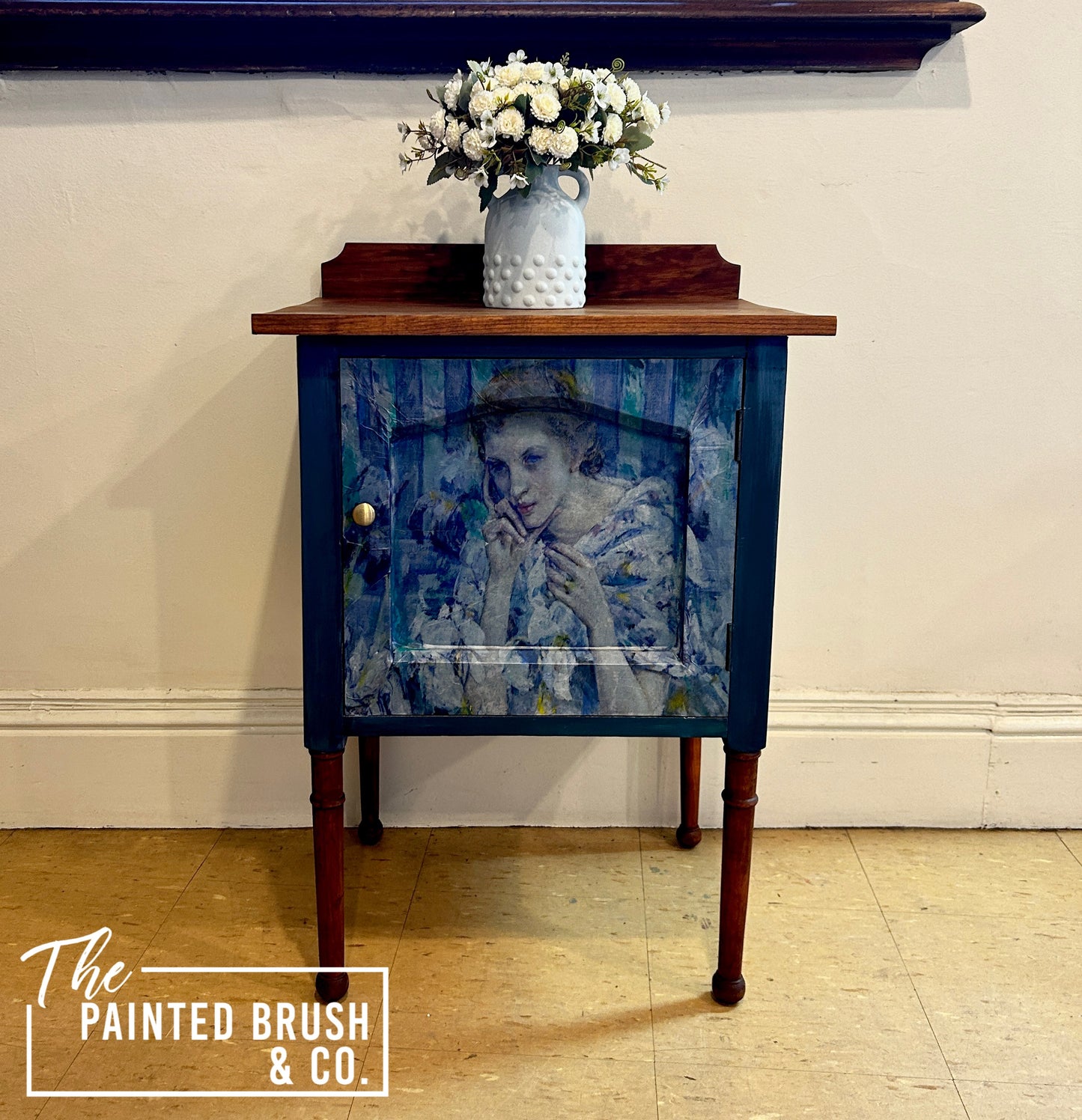 Woman in blue cabinet