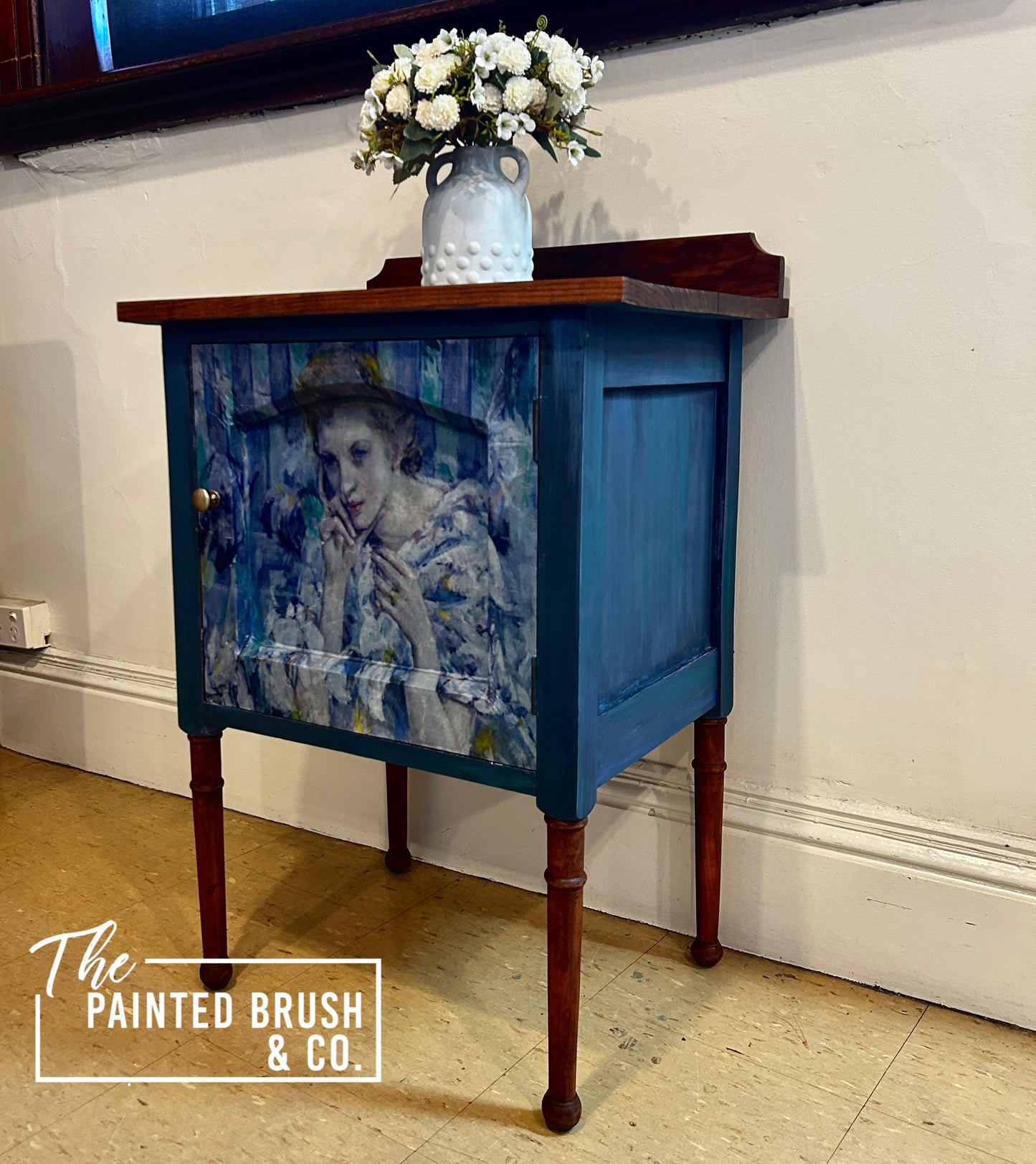 Woman in blue cabinet