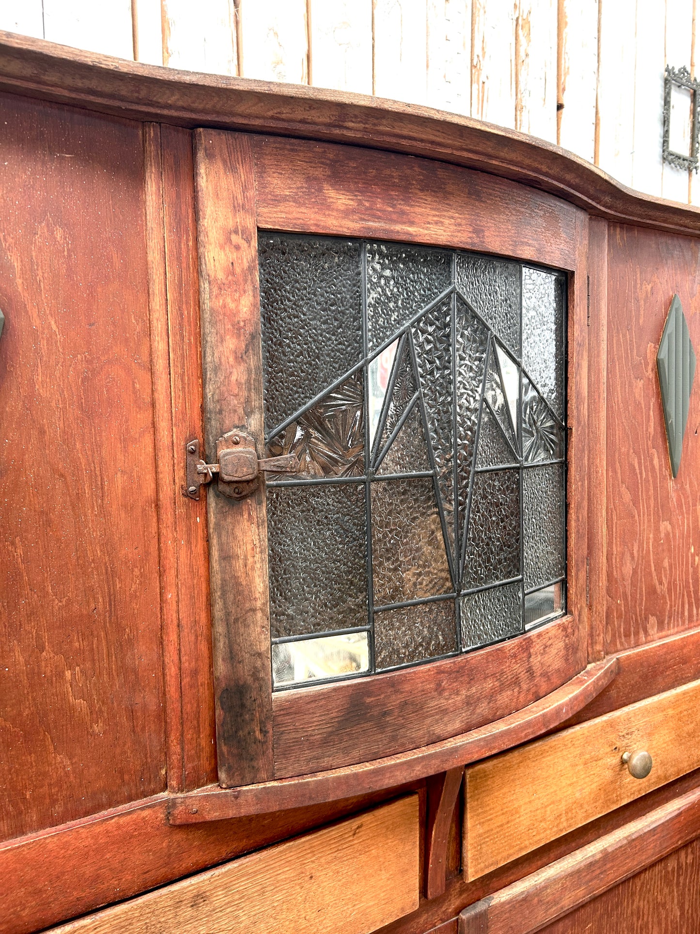 Vintage kitchen dresser with curved lead light glass