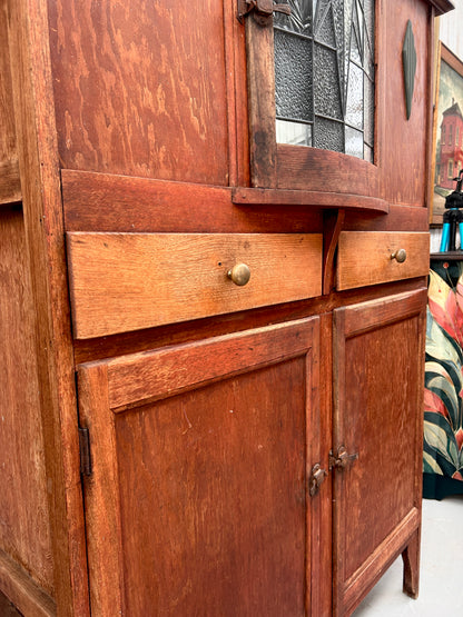 Vintage kitchen dresser with curved lead light glass