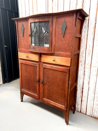 Vintage kitchen dresser with curved lead light glass