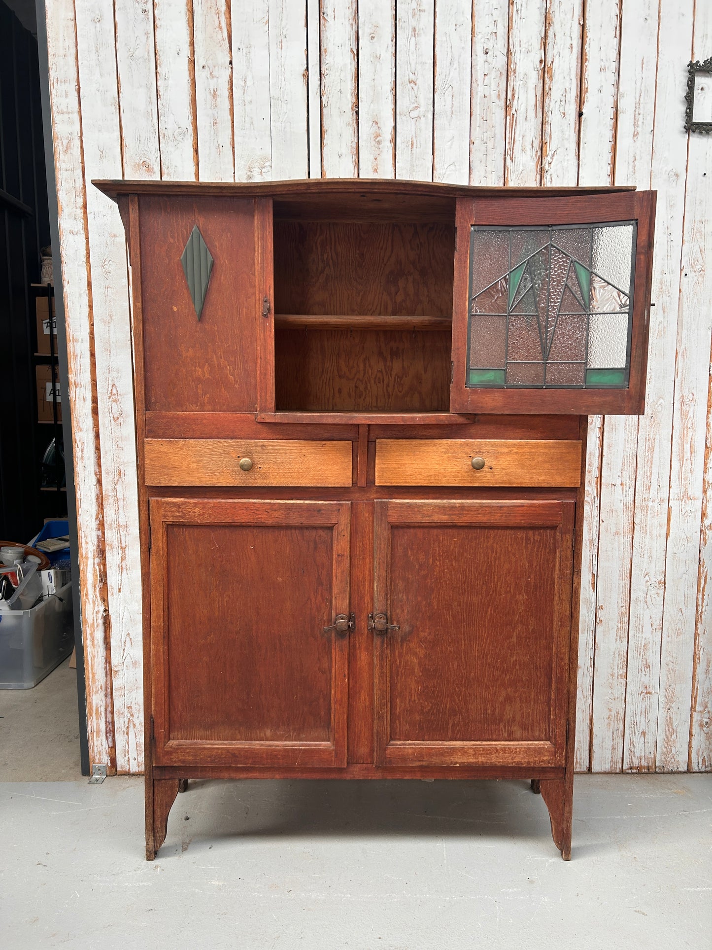 Vintage kitchen dresser with curved lead light glass